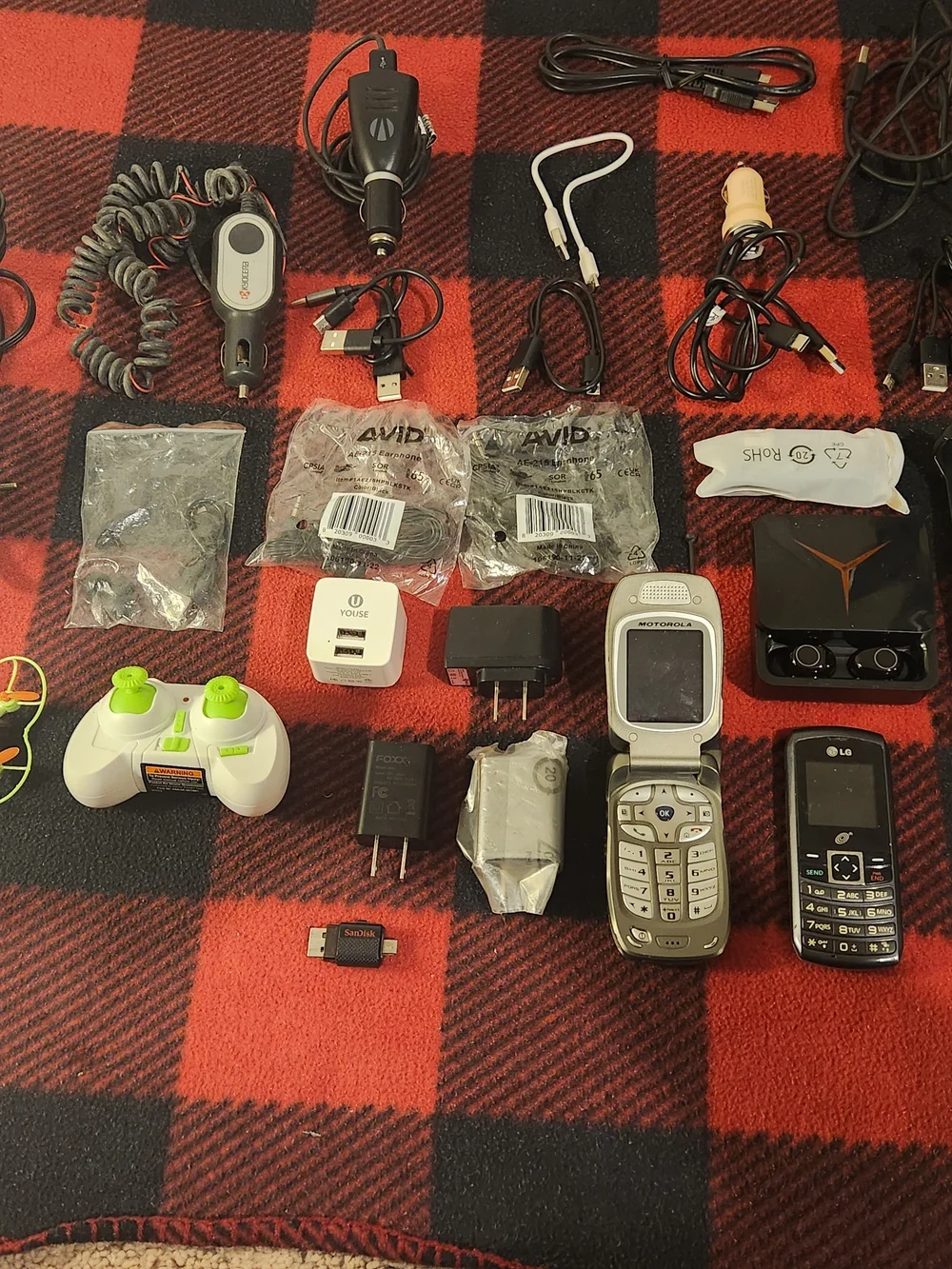 Elctronics Lot, Cellphones, Charging Cords, Remotes, And More